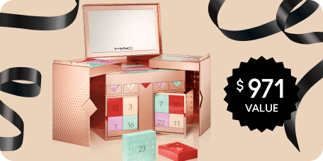Advent Calendar on beige background with black ribbons around with $971 value